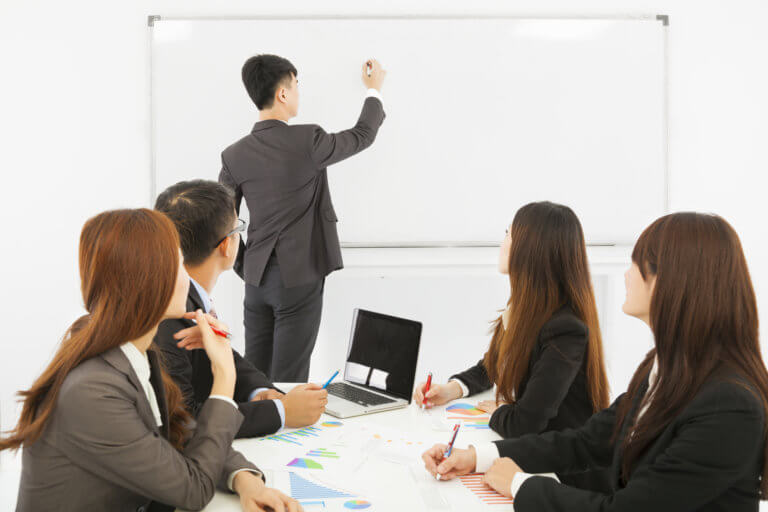 A group of employees in learning and development session.