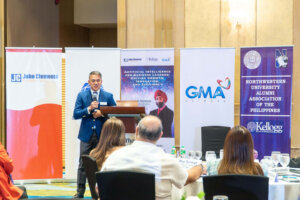 male speaker talking to audience 