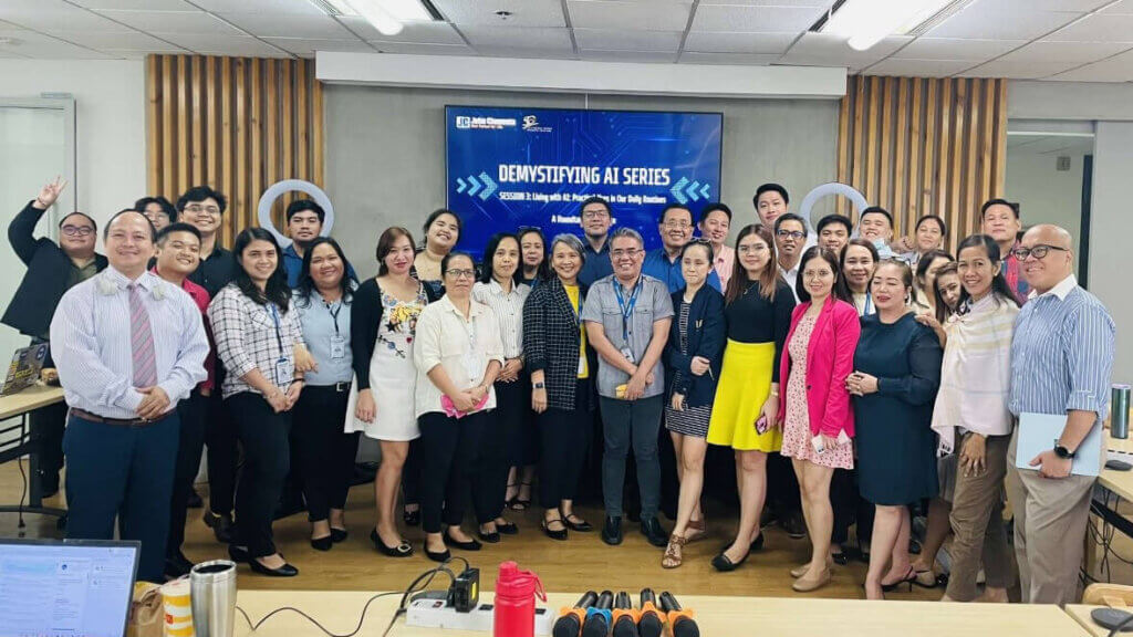 participants of a session on demystifying artificial intelligence pose for a group photo