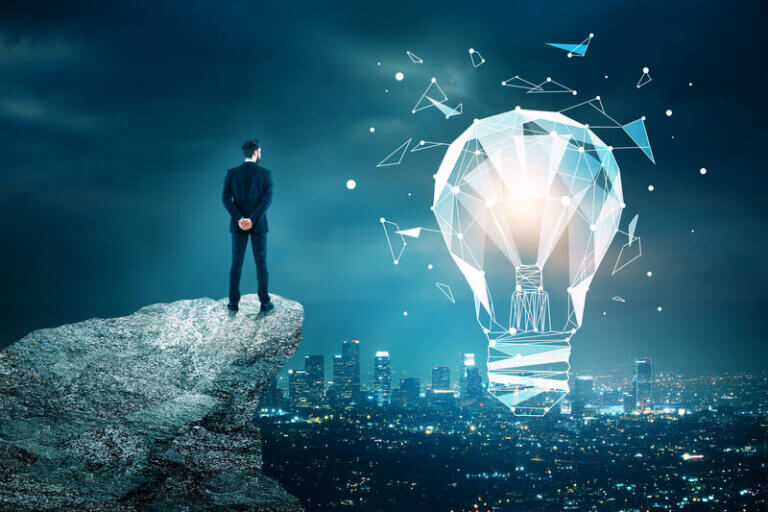 businessman on cliff looking at the city with abstract light bulb; AI in business concept