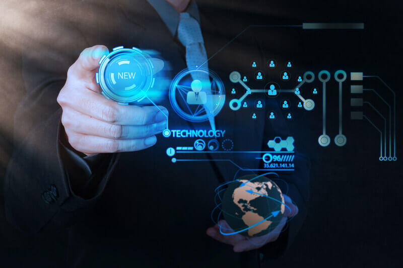 A business professional interacts with virtual interface icons representing Technology Business Management strategies, highlighting innovation, data analytics, and global connectivity.