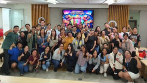 John Clements Consultants employees posing for a group photo at the Bingo Bonanza.