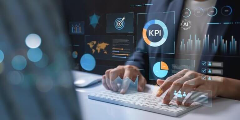 A business professional using a keyboard, surrounded by futuristic AI-driven analytics and KPI dashboards, representing AI-powered leadership.