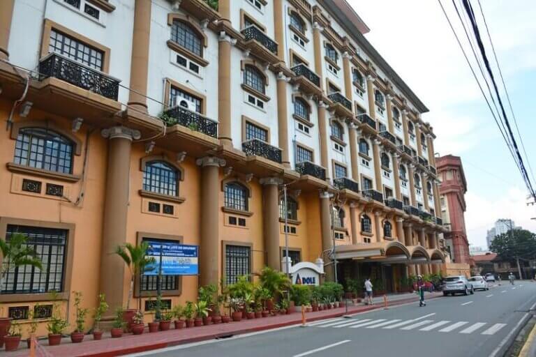 Facade of the Department of Labor and Employment (DOLE) building in the Philippines, where businesses ensure DOLE inspections compliance for labor standards.