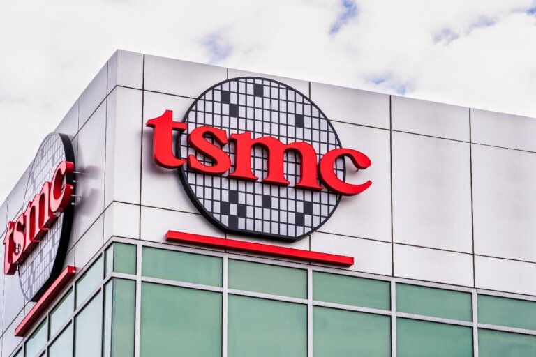 TSMC building with company logo, highlighting its role in global semiconductor supply chains amid geopolitical tensions.