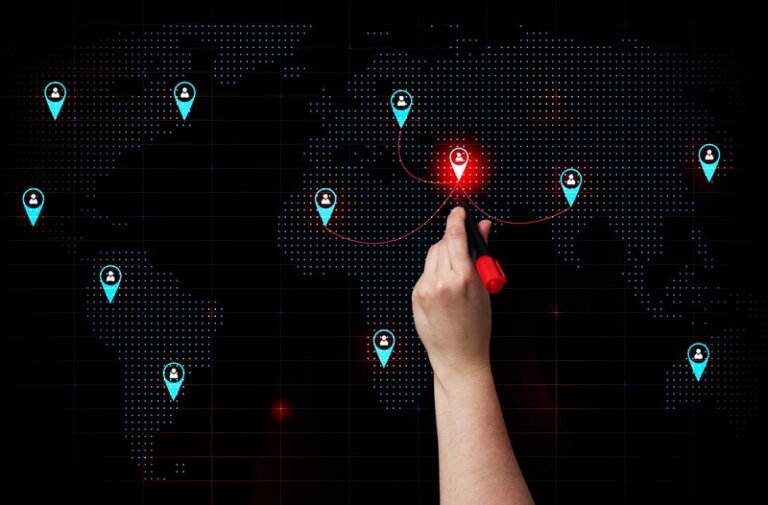 A digital world map with location markers connected by red lines, symbolizing global hiring trends and international recruitment strategies in 2025.