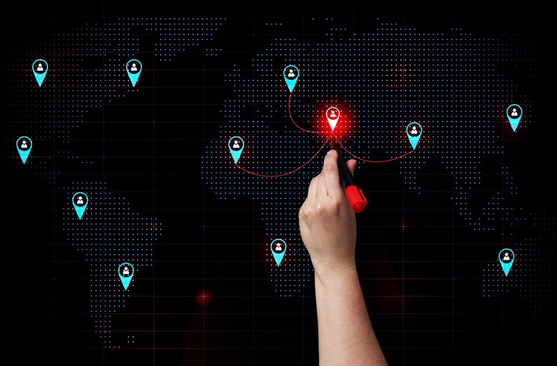 A digital world map with location markers connected by red lines, symbolizing global hiring trends and international recruitment strategies in 2025.