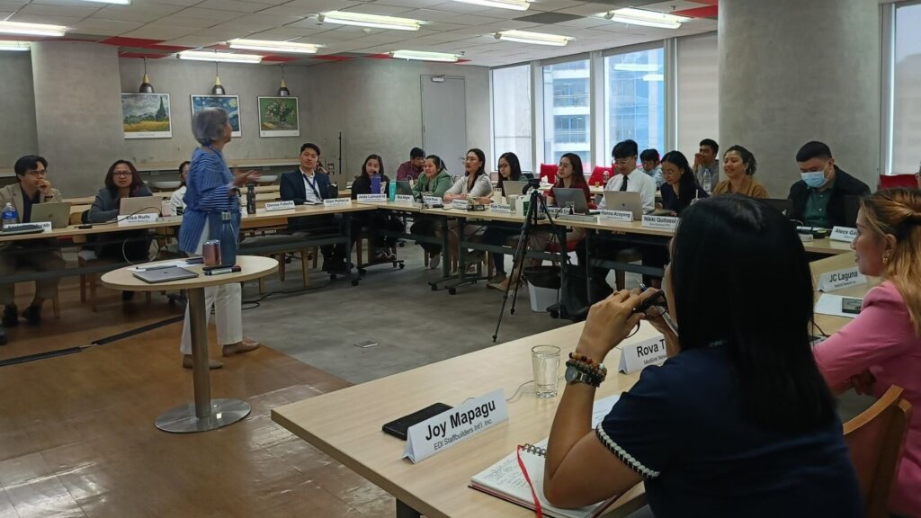 Workshop on manager boss communication strategies with employees engaged in an interactive session.