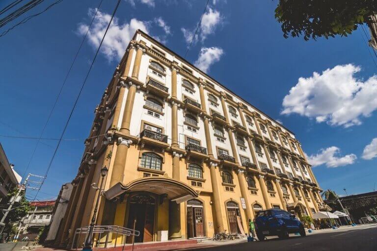 Historic government building under a clear blue sky, symbolizing institutional standards and structure, relevant to DOLE compliance audit best practices.
