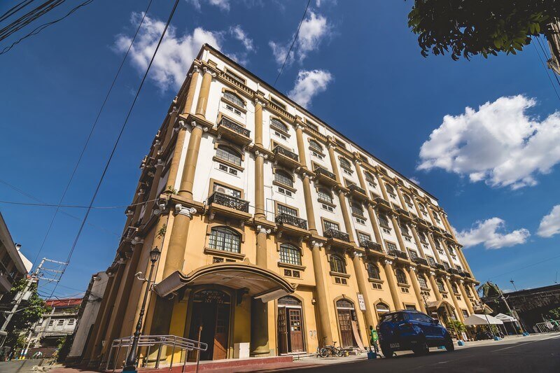 Historic government building under a clear blue sky, symbolizing institutional standards and structure, relevant to DOLE compliance audit best practices.