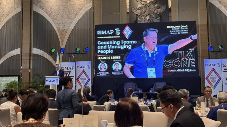 Leadership development in the Philippines event featuring Tim Cone, Coach of GILAS Pilipinas, sharing insights on coaching teams and effective management.