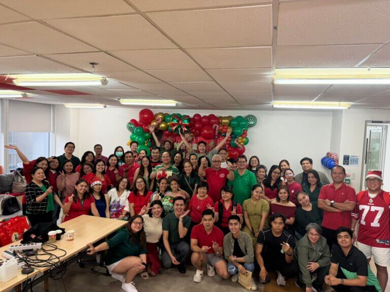  team celebrating at December Sales Conference 2025 with awards, fun run, and holiday feast