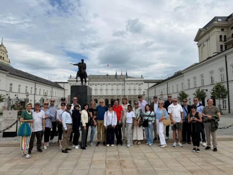 Harvard classmates in Warsaw Poland exploring leadership, resilience, and transformation during AMP reunion